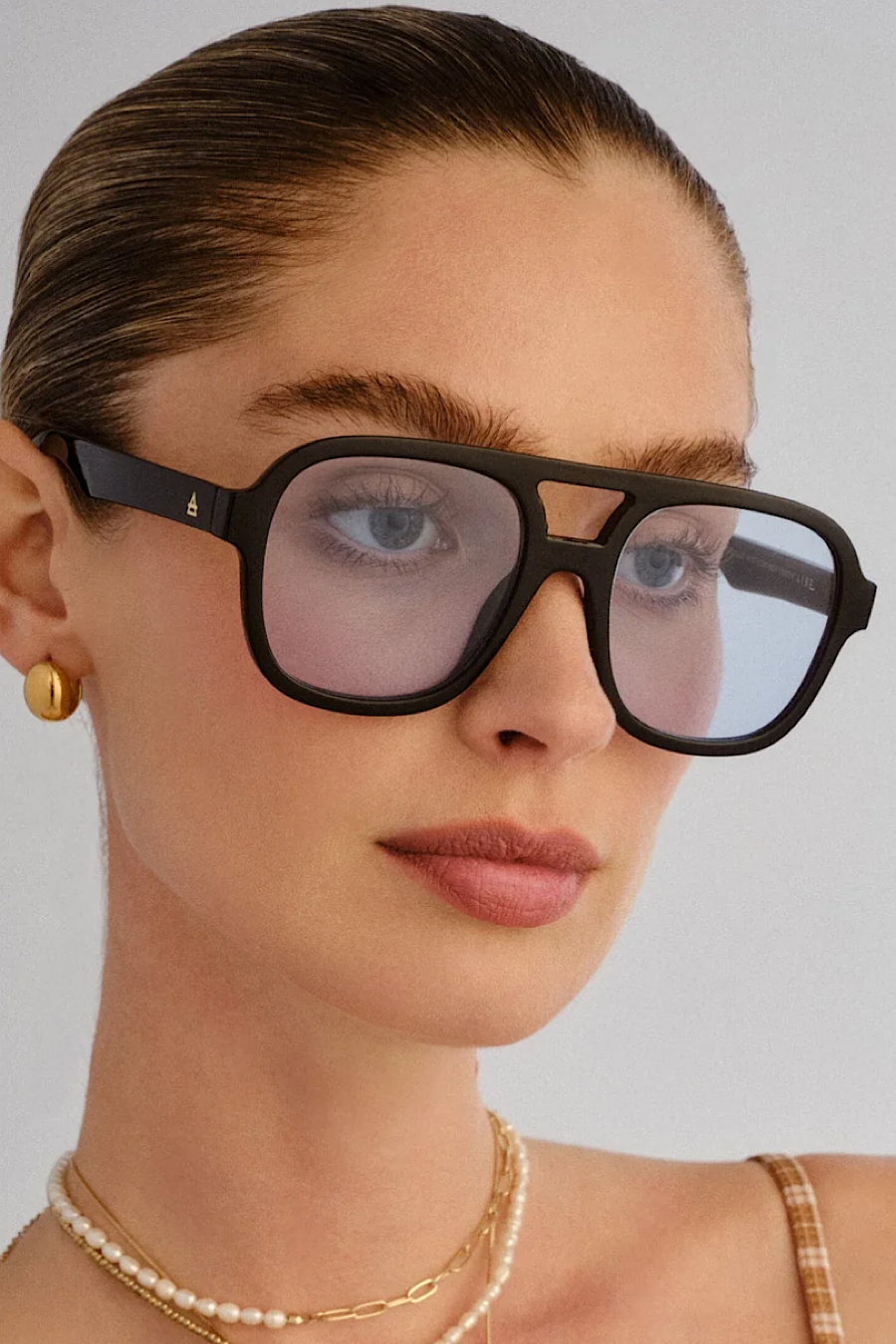 AIRE Whirlpool Sunglasses in Black & Blue Tint