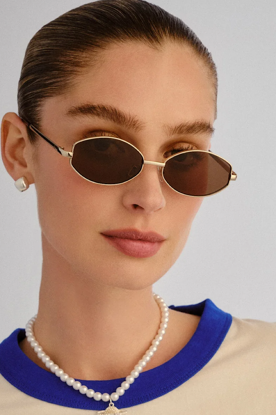 AIRE Objective Oval Sunglasses in Black, Brown or Gold