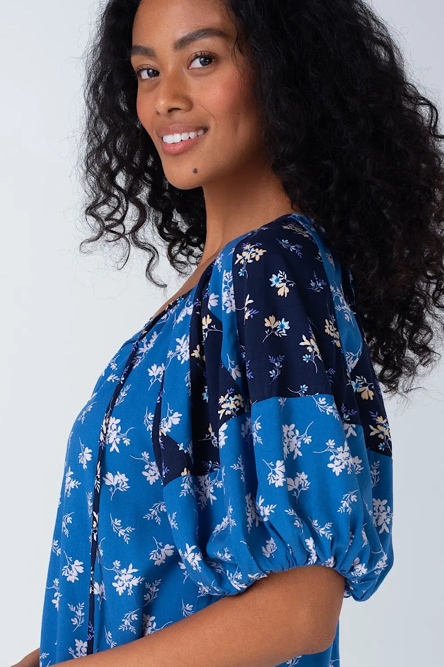 Coastal Floral Tassel Tie Neck Blouse
