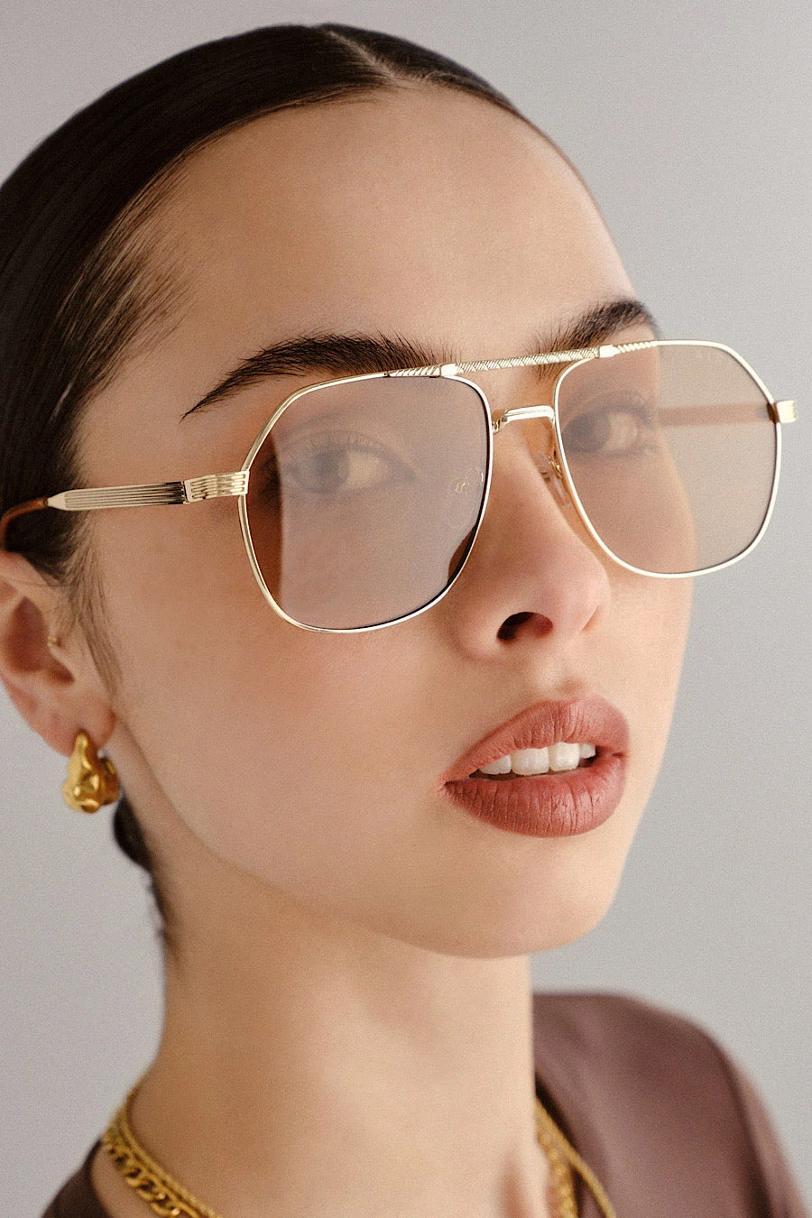 AIRE Cosmos Sunglasses in Gold &amp; Tan Tint